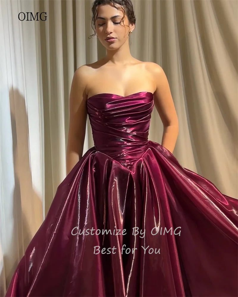 OIMG Elegant Strapless A Line Prom Gowns Shiny Backless Pleated Party Gown Floor Length Evening Dress 2026 Customized
